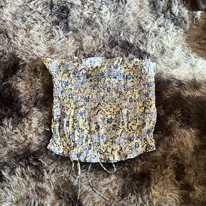 Blue, white, and yellow halter tube top